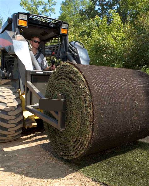 sod roller skid steer attachment|skid steer sod unroller.